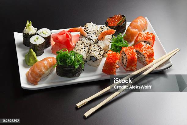 Japanese Seafood Sushi Rolls And Chopstick Stock Photo - Download Image Now - Appetizer, Asia, Asian and Indian Ethnicities