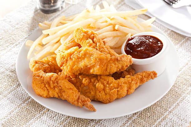 fotografii de stoc, fotografii și imagini scutite de redevențe cu organic crispy chicken strips - afectuos