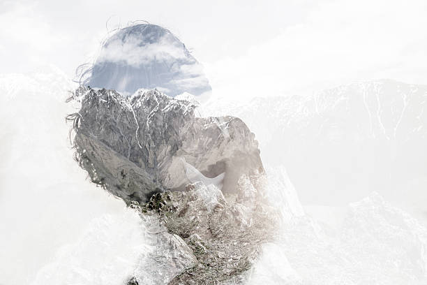 istock Double exposure with young woman and mountains. 1628965808