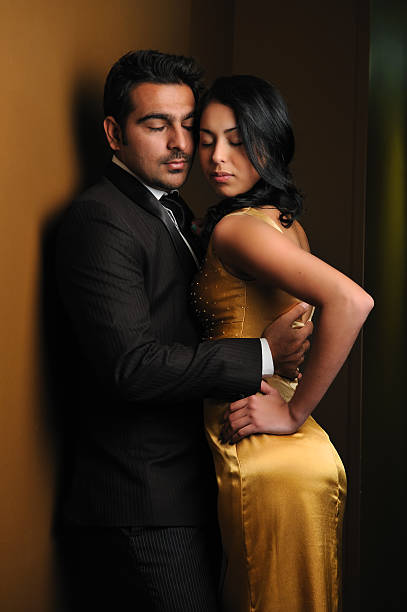 istock Attractive couple flirting in the dark 162897293
