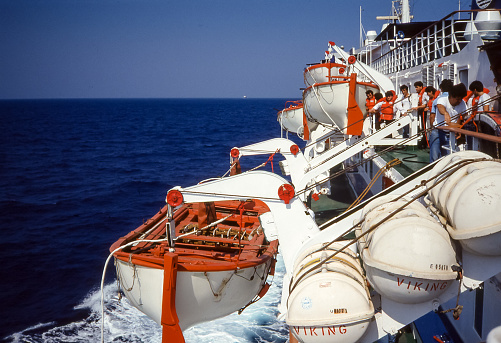 Aegean Sea - aug 1990:  abandon ship simulation with lifeboats while sailing on a scheduled ferry between the islands of the Aegean Sea.