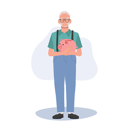 Retirement Savings Concept. Happy Elderly man Holding Piggy Bank. Smiling Senior man with Piggy Bank