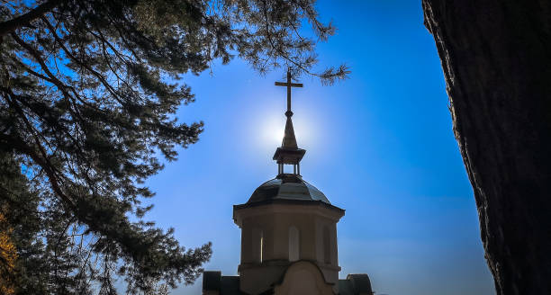 istock Autumn landscape with an old chapel in a mountain village 1629010607