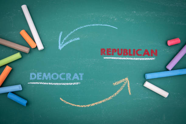 istock Democrat and Republican Concept. Written text on a green chalk board 1629012804