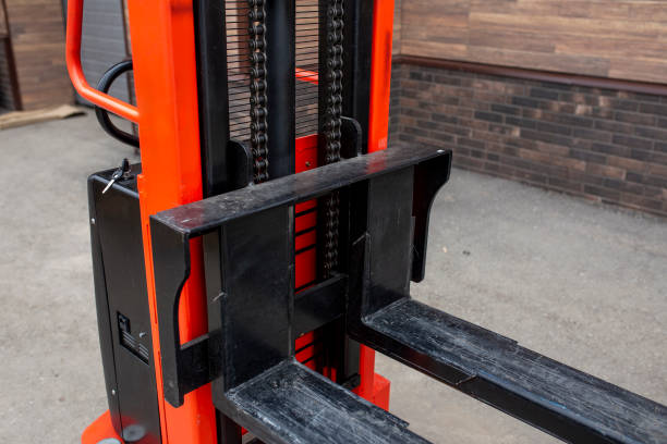 istock red empty forklift parked outdoors, cargo delivery and distribution, production warehouse 1629031201