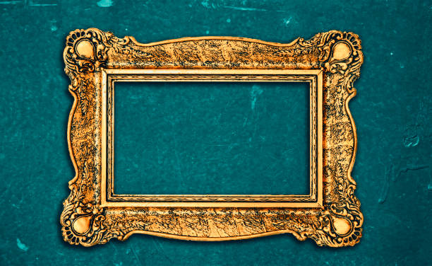 istock Vintage luxury golden frame with ornate baroque decoration on rustic textured wall background. 1629041611