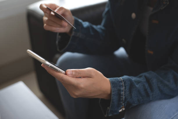 istock Young woman hands holding credit card, using smart mobile phone for digital banking, internet paynet, online shopping via mobile banking app, financial technology, E-commerce 1629042698