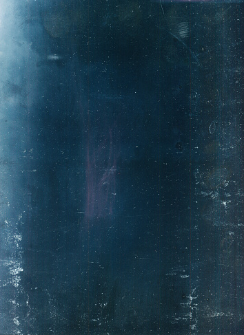 Aged film overlay. Dust scratches noise. Weathered texture. Pink blue color dirt stains fingerprints on dark gritty surface illustration abstract background.