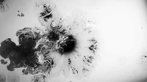 istock Ink splash black water swirl paint splatters fluid 1629063167