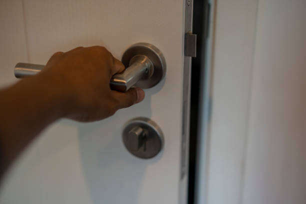 istock Door handle with white wooden door 1629067533