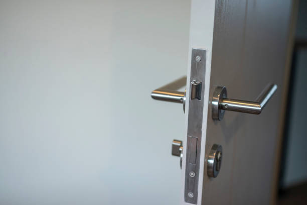 istock Door handle with white wooden door 1629067534