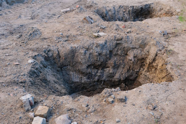 Holes were dug for foundation work on the construction site