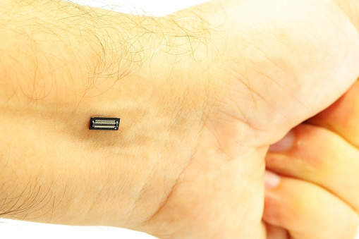 Connection port on a person's wrist. Cyborg person concept. People with wearable technology