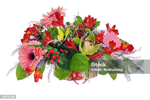 Colorful Floral Arrangement From Lilies Cloves And Orchids Stock Photo - Download Image Now