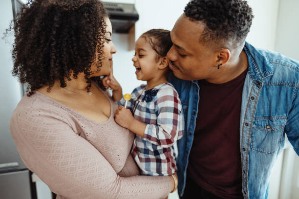 istock Afro-Caribbean family with daughter having fun 1629106024