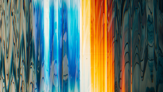 Glowing glitch noise. Color distortion. Light flare. Blue orange white waves texture artifacts on black illustration abstract background.