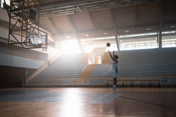 istock Man practising with basketball on court 1629131210