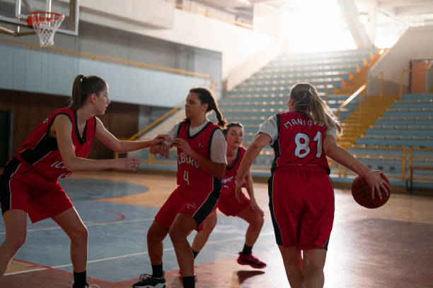 istock Basketball players playing on court 1629131259