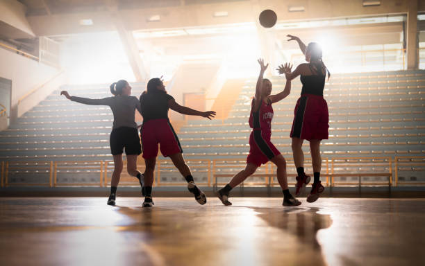 istock Basketball players playing on court 1629131270