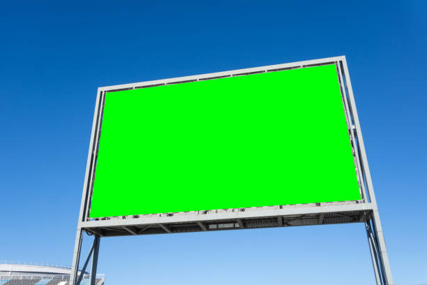 istock Billboard blank mockup and template empty frame for logo text on exterior street advertising poster green screen city background, modern flat style, outdoor banner advertisement. 1629151169