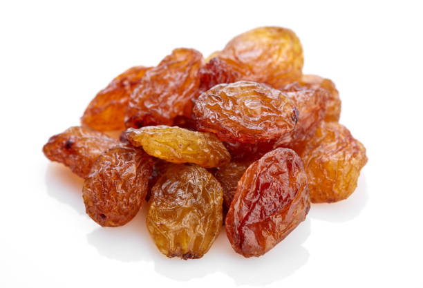 istock Raisins on a white background. Dried grapes. 1629164546
