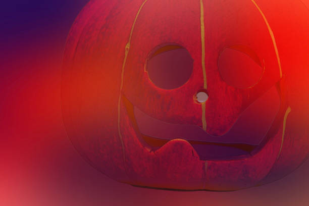 Close up of pumpkin head decorated for Halloween background.