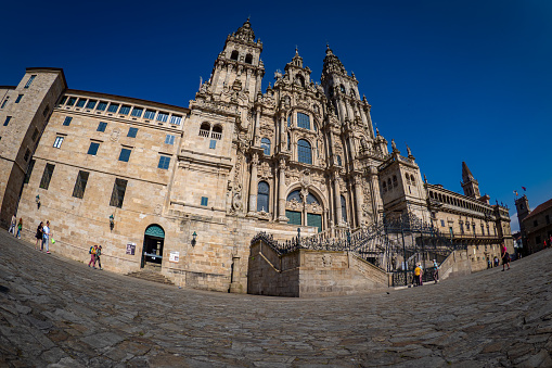 Arriving in front of the Cathedral of Santiago de Compostela after completing the Camino de Santiago
