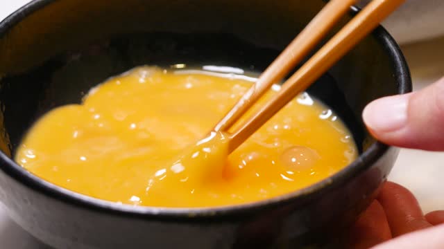 Video of stirring raw eggs.