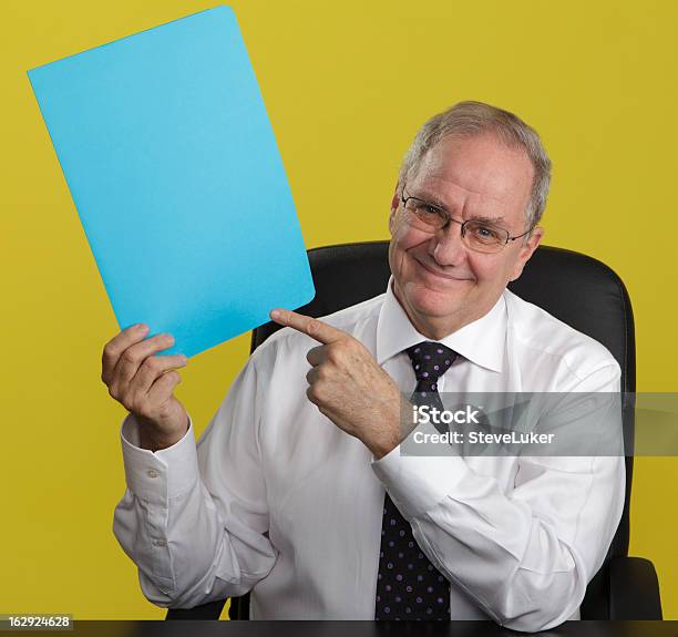 Smiling Businessman Pointing At Blank Sign Stock Photo - Download Image Now - Men, 60-64 Years, 60-69 Years