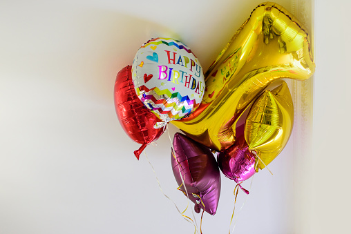 Number 1 one and colour balloons on the ceiling