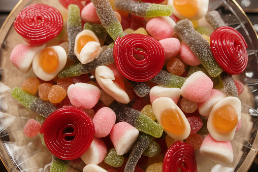 A full frame image of a wide variety of candies
