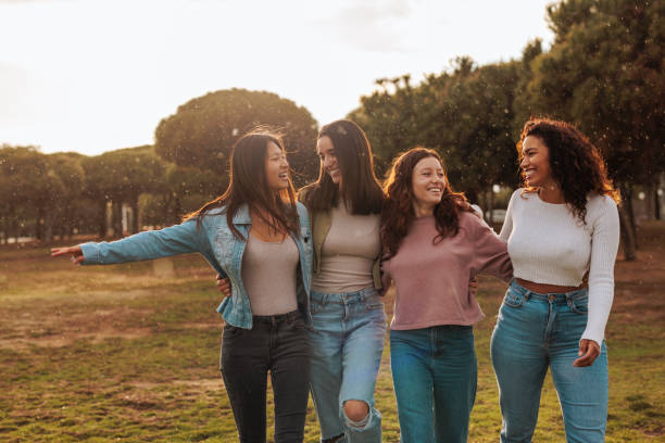 istock Female best friends having fun in the field 1629260876