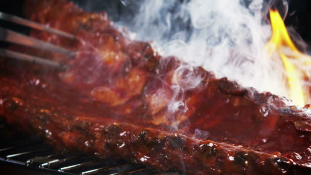 BBQ RIBS ON GRILL-SLOW MOTION