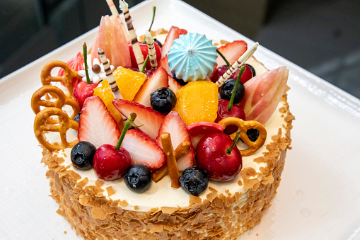 White cream cake with mixed fruity