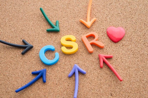 istock Color highlight arrows around CSR alphabets word on corkboard background with red heart. 1629303589