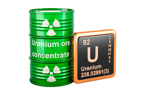 Green drums full of uranium ore with chemical element icon uranium U, 3D rendering isolated on transparent background