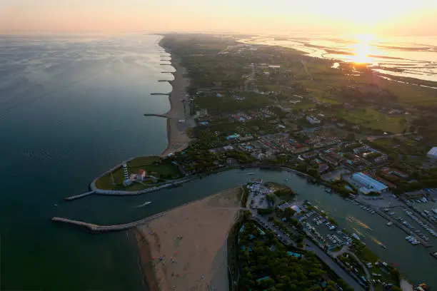 Photo of Italy, Jesolo. Lido di Jesolo, or Jesolo Lido, Europe beach and city area of city of Jesolo in the province of Venice, Aerial View in the evening