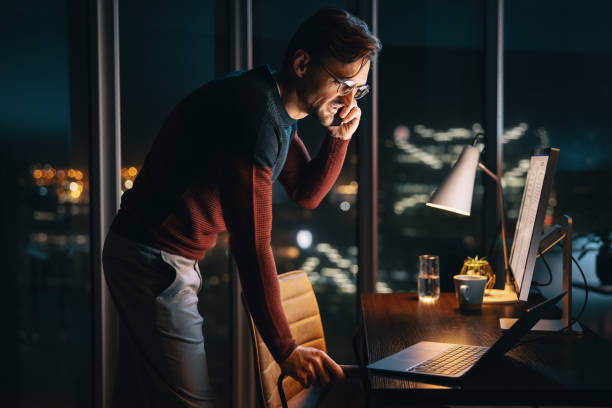 istock Businessman making phone calls to discuss work projects at night 1629352839