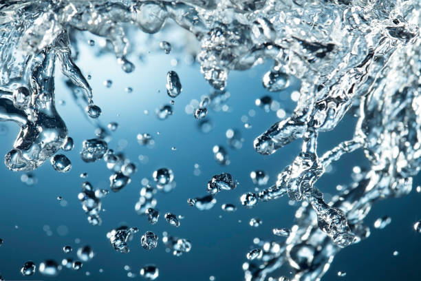 istock Abstract Splash of Water on a Blue Background 1629385928