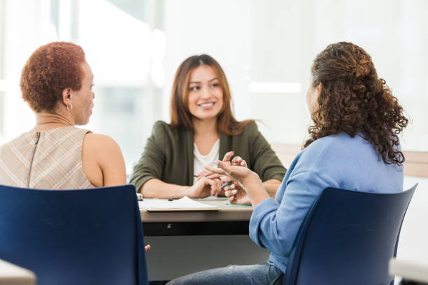 istock Three diverse businesswomen discuss strategy in meeting 1629419800
