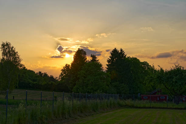 istock Beautiful colored sky with sunset at Swiss town. 1629429290