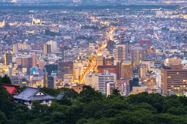 Nagano City, Japan at dusk from Asahi Mountain.