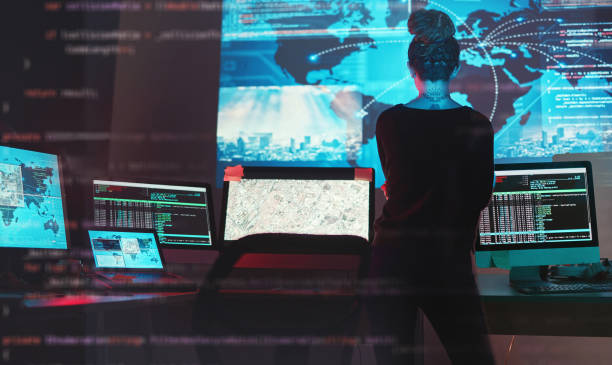 istock Cybersecurity, woman hacker and global network code for phishing, ransomware and cyber terrorism search. Maps, digital database and IT website in dark room for virtual malware hacking fix of employee 1629459642