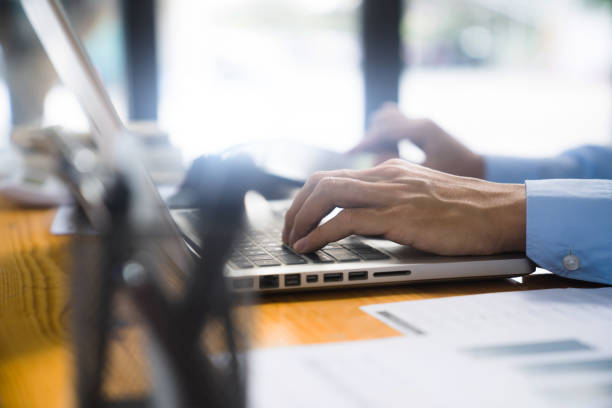 istock Close up of businessperson using laptop working with digital data. 1629461004