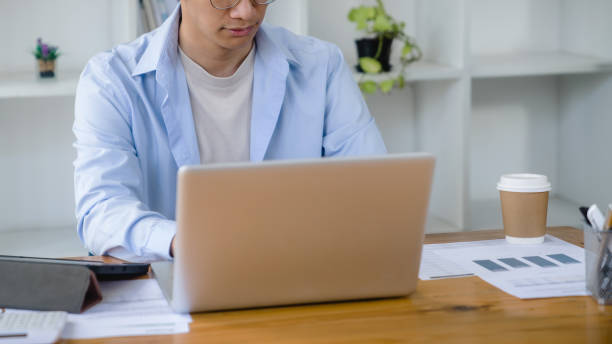 istock Close up of businessperson using laptop working with digital data. 1629461332