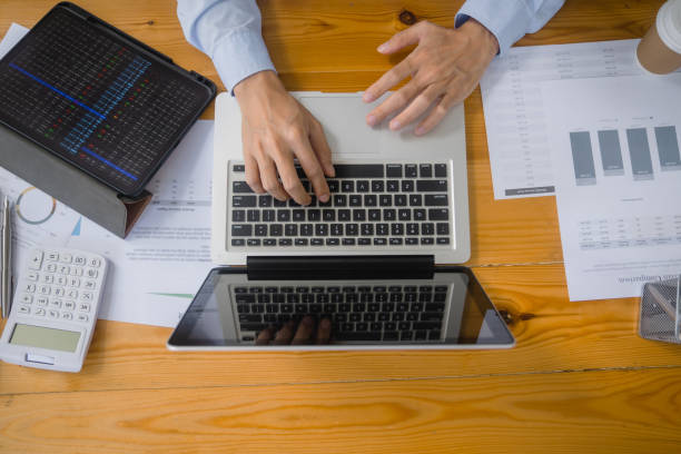 istock Close up of businessperson using laptop working with digital data. 1629461608
