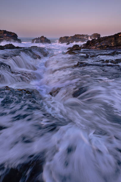 istock Rocks and Waves of Sawarna 1629464394
