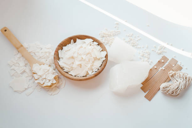 istock Set for crafting candle on white background. Eco soy wax and candle making tools top view, flat lay. DIY candles. Hobby concept 1629473427