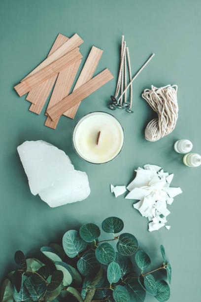 istock Set for candle making on a green background top view, flat lay 1629477542