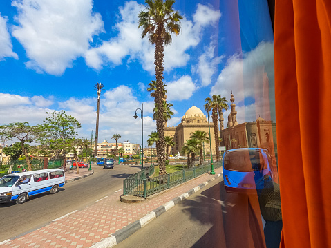 Mosques of Sultan Hassan and Al-Rifai In Cairo In Egypt. View from the bus window.